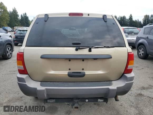 2001 Jeep Grand Cherokee Laredo с VIN 1J4GW48S51C595710, выставлен на аукционе Copart как лот 82590275 с пробегом 71 420 миль миль и Списание • Salvage title. История ставок и продаж доступна на DreamBid. Изображение 6.