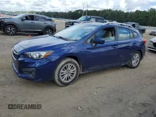 2018 Subaru Impreza Premium with VIN 4S3GTAD62J3714075, listed as a Copart auction lot 68227595 with 148,222 mi miles and Salvage title. Bid and sale history available at DreamBid. Image 1.