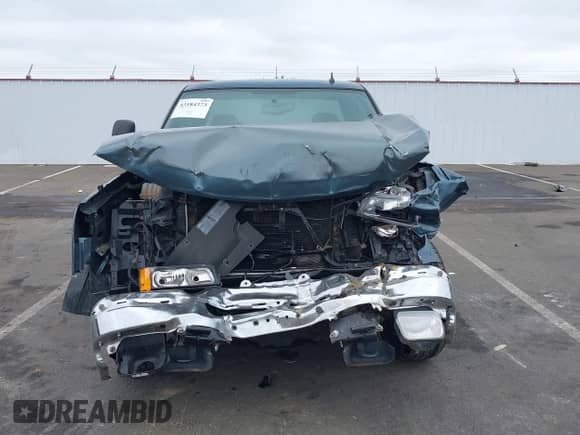2006 Chevrolet Silverado 1500 LS z VIN 1GCEC19T06Z162702, wystawiony jako IAAI lot #43184373 z przebiegiem Nie podano mil oraz . Historia ofert i sprzedaży dostępna na DreamBid. Obrazek 13.