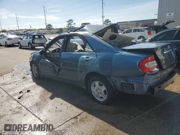 2003 Toyota Camry LE с VIN 4T1BF32K53U555042, выставлен на аукционе Copart как лот 49998285 с пробегом Не указан миль и Списание • Salvage title. История ставок и продаж доступна на DreamBid. Изображение 2.