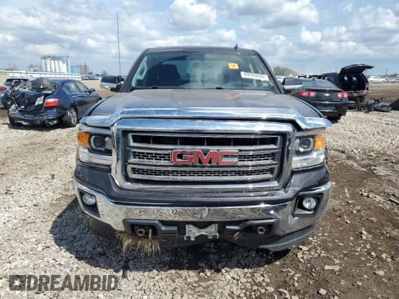 2014 GMC Sierra 1500 SLE z VIN 3GTU2UEC3EG446426, wystawiony jako Copart lot #69783535 z przebiegiem Nie podano mil oraz Szkoda całkowita • Salvage title. Historia ofert i sprzedaży dostępna na DreamBid. Obrazek 5.