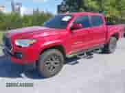 2020 Toyota Tacoma SR5 with VIN 3TYAZ5CN4LT001995, listed as a IAAI auction lot 43104841 with 59,820 mi miles and . Bid and sale history available at DreamBid. Image 2.