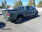2021 Toyota Tacoma SR5 z VIN 3TMDZ5BN8MM114649, wystawiony jako IAAI lot #43493615 z przebiegiem 63 288 mil mil oraz . Historia ofert i sprzedaży dostępna na DreamBid. Obrazek 4.