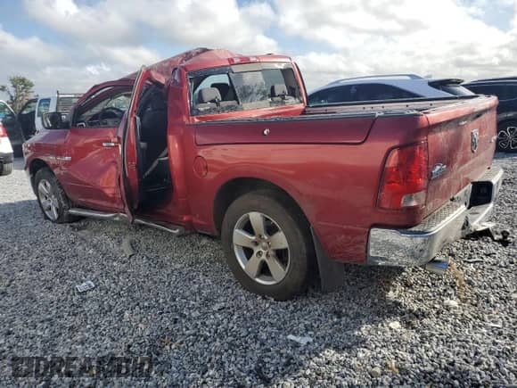 2009 Dodge 1500 SLT with VIN 1D3HV13T19J523431, listed as a Copart auction lot 81769415 with 199,495 mi miles and Salvage title. Bid and sale history available at DreamBid. Image 2.