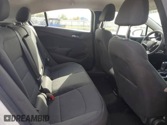 2018 Chevrolet Cruze LT z VIN 3G1BE6SM4JS576075, wystawiony jako Copart lot #81135265 z przebiegiem 87 663 mil mil oraz Nie do naprawy • Non repairable. Historia ofert i sprzedaży dostępna na DreamBid. Obrazek 10.