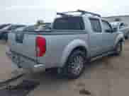 2011 Nissan Frontier Pro-4X z VIN 1N6AD0EV6BC427890, wystawiony jako IAAI lot #42316203 z przebiegiem 259 337 mil mil oraz . Historia ofert i sprzedaży dostępna na DreamBid. Obrazek 4.