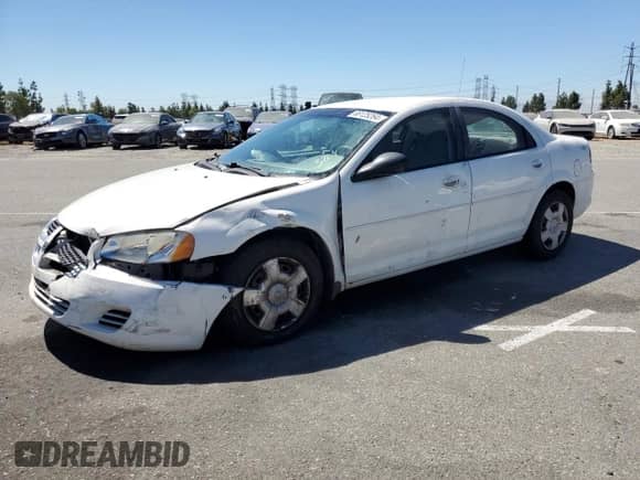 2006 Dodge Stratus SXT with VIN 1B3EL46X56N151809, listed as a Copart auction lot 68125264 with 122,839 mi miles and Salvage title. Bid and sale history available at DreamBid. Image 1.