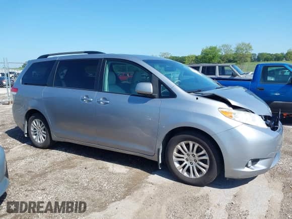 2011 Toyota Sienna XLE AAS with VIN 5TDYK3DCXBS093595, listed as a IAAI auction lot 42807201 with 230,913 mi miles and . Bid and sale history available at DreamBid. Image 13.