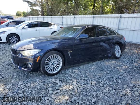 2015 BMW 4 Series 428i xDrive z VIN WBA4C9C55FD330350, wystawiony jako Copart lot #69912125 z przebiegiem 177 235 mil mil oraz Szkoda całkowita • Salvage title. Historia ofert i sprzedaży dostępna na DreamBid. Obrazek 1.