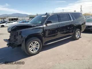 2019 Chevrolet Suburban LS with VIN 1GNSCGKC9KR258037, listed as a Copart auction lot 51495435 with 149,346 mi miles and Salvage title. Bid and sale history available at DreamBid. Image 1.