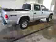 2003 Dodge Dakota Sport с VIN 1D7HG38N03S170907, выставлен на аукционе Copart как лот 46998985 с пробегом 97 805 миль миль и Списание • Salvage title. История ставок и продаж доступна на DreamBid. Изображение 3.
