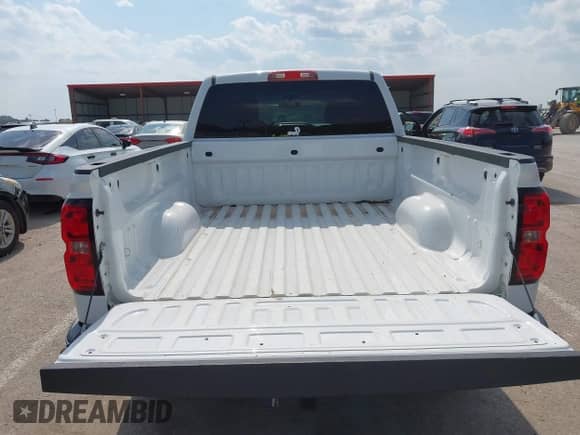 2014 Chevrolet Silverado 1500 LT with VIN 1GCVKREC5EZ412652, listed as a IAAI auction lot 42420856 with 165,891 mi miles and . Bid and sale history available at DreamBid. Image 18.