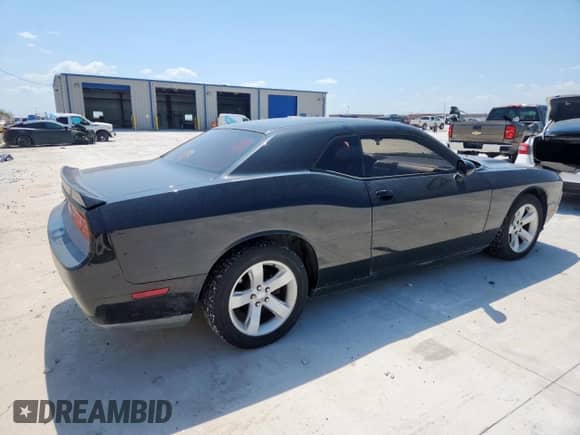2013 Dodge Challenger SXT с VIN 2C3CDYAG5DH704373, выставлен на аукционе Copart как лот 70580635 с пробегом 113 104 миль миль и Списание • Salvage title. История ставок и продаж доступна на DreamBid. Изображение 3.