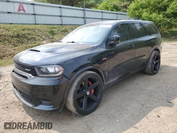 2019 Dodge Durango SRT with VIN 1C4SDJGJ8KC723078, listed as a Copart auction lot 58823225 with 98,621 mi miles and Clean title. Bid and sale history available at DreamBid. Image 1.