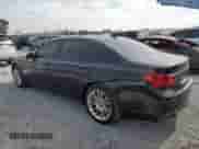 2014 BMW 7 Series 740Li with VIN WBAYE4C52ED138770, listed as a Copart auction lot 53647665 with 106,827 mi miles and Salvage title. Bid and sale history available at DreamBid. Image 2.