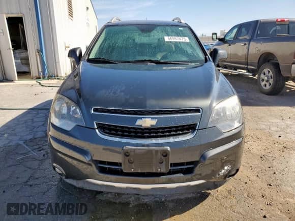 2015 Chevrolet Captiva Sport LTZ z VIN 3GNAL4EK8FS513387, wystawiony jako Copart lot #66967475 z przebiegiem 107 860 mil mil oraz Czysty tytuł • Clean title. Historia ofert i sprzedaży dostępna na DreamBid. Obrazek 5.