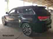 2018 Jeep Grand Cherokee Overland with VIN 1C4RJFCTXJC453250, listed as a Copart auction lot 64644784 with 194,353 mi miles and Salvage title. Bid and sale history available at DreamBid. Image 2.