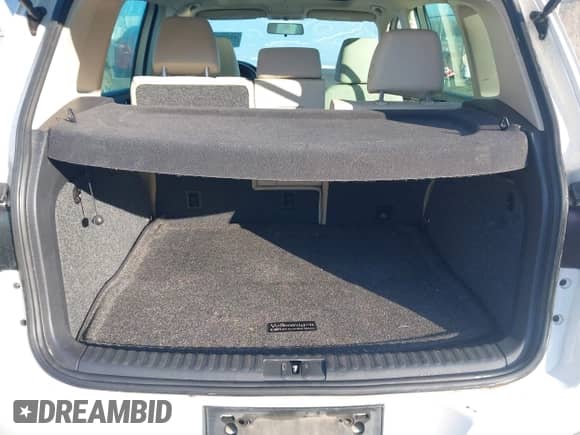 2014 Volkswagen Tiguan SEL with VIN WVGAV3AX8EW538318, listed as a IAAI auction lot 41277703 with 130,827 mi miles and . Bid and sale history available at DreamBid. Image 8.