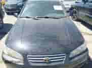 2001 Toyota Camry LE z VIN JT2BF28K110306353, wystawiony jako IAAI lot #42690685 z przebiegiem 309 278 mil mil oraz . Historia ofert i sprzedaży dostępna na DreamBid. Obrazek 6.