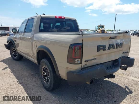 2017 Ram 1500 Rebel z VIN 1C6RR7YT8HS619828, wystawiony jako IAAI lot #42873979 z przebiegiem 136 471 mil mil oraz . Historia ofert i sprzedaży dostępna na DreamBid. Obrazek 3.