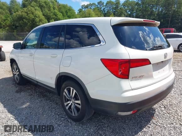 2016 Honda Pilot EX-L with VIN 5FNYF5H51GB036662, listed as a IAAI auction lot 43271267 with 142,010 mi miles and . Bid and sale history available at DreamBid. Image 3.