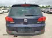 2013 Volkswagen Tiguan SE z VIN WVGAV3AX9DW056696, wystawiony jako Copart lot #54721695 z przebiegiem 108 656 mil mil oraz Szkoda całkowita • Salvage title. Historia ofert i sprzedaży dostępna na DreamBid. Obrazek 6.