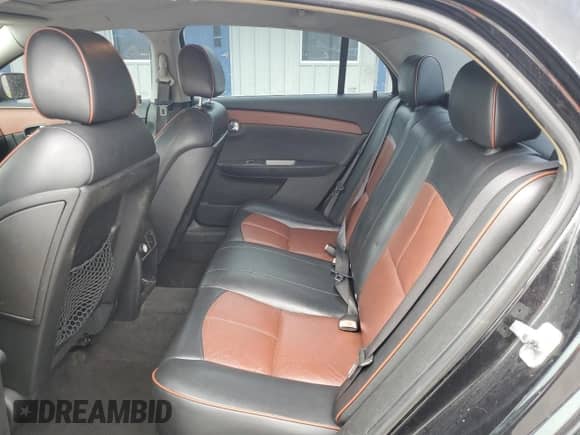 2009 Chevrolet Malibu LTZ with VIN 1G1ZK57B69F136853, listed as a Copart auction lot 71663625 with 154,853 mi miles and Salvage title. Bid and sale history available at DreamBid. Image 10.