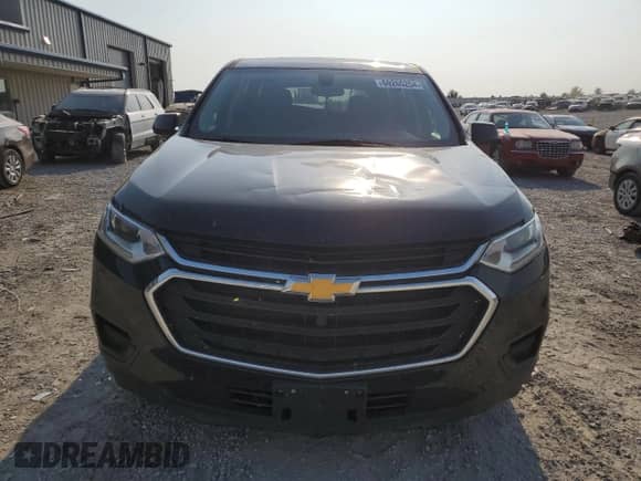2018 Chevrolet Traverse LS with VIN 1GNEVLKW3JJ200822, listed as a Copart auction lot 69265254 with 128,829 mi miles and Salvage title. Bid and sale history available at DreamBid. Image 5.