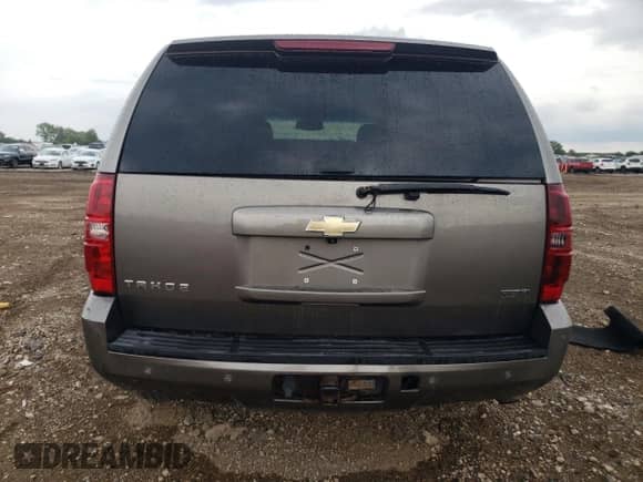 2011 Chevrolet Tahoe LS с VIN 1GNSKAE05BR179000, выставлен на аукционе Copart как лот 71307315 с пробегом 158 165 миль миль и Списание • Salvage title. История ставок и продаж доступна на DreamBid. Изображение 6.