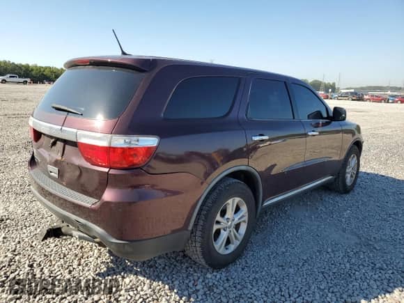 2012 Dodge Durango SXT with VIN 1C4RDJAG3CC147235, listed as a Copart auction lot 84365645 with 242,191 mi miles and Salvage title. Bid and sale history available at DreamBid. Image 3.