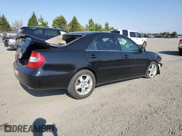 2002 Toyota Camry XLE с VIN 4T1BF30K82U015833, выставлен на аукционе Copart как лот 70534855 с пробегом 191 212 миль миль и Списание • Salvage title. История ставок и продаж доступна на DreamBid. Изображение 3.