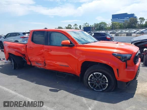 2024 Toyota Tacoma SR5 with VIN 3TYKB5FN7RT014768, listed as a IAAI auction lot 43051750 with 18,990 mi miles and . Bid and sale history available at DreamBid. Image 14.
