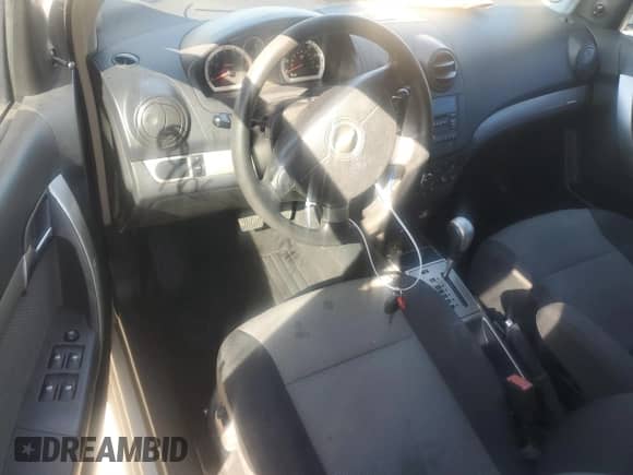 2009 Chevrolet Aveo 1LT z VIN KL1TD66E79B637368, wystawiony jako Copart lot #76706294 z przebiegiem 96 478 mil mil oraz Szkoda całkowita • Salvage title. Historia ofert i sprzedaży dostępna na DreamBid. Obrazek 8.