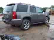 2013 Chevrolet Tahoe LT with VIN 1GNSKBE04DR339098, listed as a IAAI auction lot 42989580 with 220,959 mi miles and . Bid and sale history available at DreamBid. Image 4.