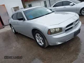 2009 Dodge Charger SE with VIN 2B3LA43D49H571145, listed as a IAAI auction lot 41703789 with 123,966 mi miles and . Bid and sale history available at DreamBid. Image 1.