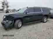 2019 Chevrolet Suburban LS z VIN 1GNSCGKC9KR219965, wystawiony jako Copart lot #89628285 z przebiegiem 283 316 mil mil oraz Szkoda całkowita • Salvage title. Historia ofert i sprzedaży dostępna na DreamBid. Obrazek 1.