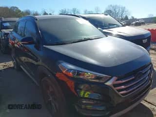 2017 Hyundai Tucson Sport with VIN KM8J33A2XHU573758, listed as a IAAI auction lot 41428068 with 119,589 mi miles and . Bid and sale history available at DreamBid. Image 1.