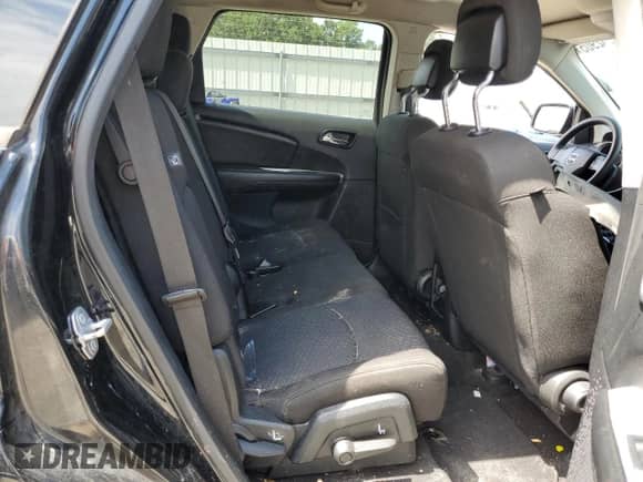 2019 Dodge Journey SE with VIN 3C4PDCBG0KT870223, listed as a Copart auction lot 70632905 with 116,179 mi miles and Salvage title. Bid and sale history available at DreamBid. Image 11.