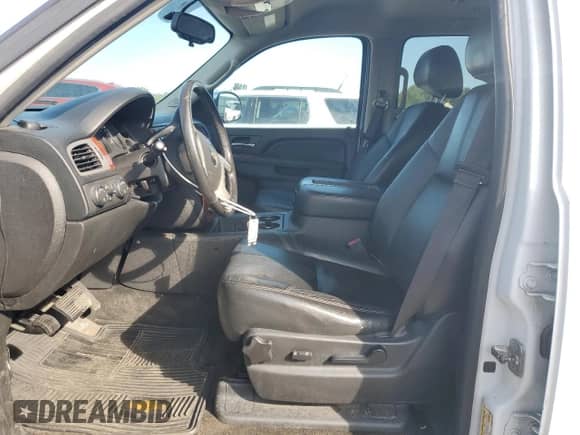 2013 Chevrolet Suburban LT с VIN 1GNSKJE71DR192536, выставлен на аукционе Copart как лот 69883115 с пробегом 139 204 миль миль и Списание • Salvage title. История ставок и продаж доступна на DreamBid. Изображение 7.