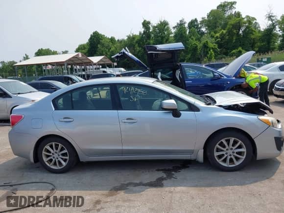 2014 Subaru Impreza Premium с VIN JF1GJAC6XEH005884, выставлен на аукционе IAAI как лот 42412958 с пробегом 122 841 миль миль и . История ставок и продаж доступна на DreamBid. Изображение 13.