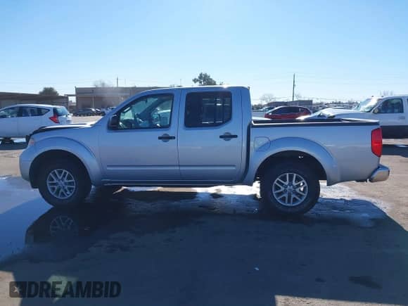 2016 Nissan Frontier S with VIN 1N6AD0ER7GN701564, listed as a IAAI auction lot 41372280 with 233,201 mi miles and . Bid and sale history available at DreamBid. Image 14.