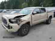 2018 Toyota Tacoma SR5 z VIN 3TMAZ5CN9JM063918, wystawiony jako Copart lot #82554545 z przebiegiem 276 874 mil mil oraz Szkoda całkowita • Salvage title. Historia ofert i sprzedaży dostępna na DreamBid. Obrazek 1.