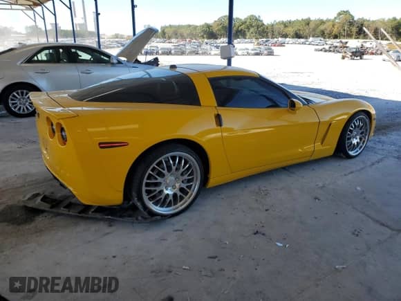 2005 Chevrolet Corvette с VIN 1G1YY24U455113957, выставлен на аукционе Copart как лот 85754345 с пробегом 127 979 миль миль и Списание • Salvage title. История ставок и продаж доступна на DreamBid. Изображение 3.