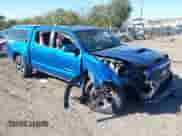 2018 Toyota Tacoma SR z VIN 3TMCZ5AN6JM157248, wystawiony jako IAAI lot #43500126 z przebiegiem 91 765 mil mil oraz . Historia ofert i sprzedaży dostępna na DreamBid. Obrazek 1.