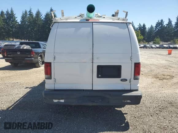 2012 Ford Econoline Cargo Commercial with VIN 1FTNE1EW2CDB34452, listed as a Copart auction lot 66587925 with 212,296 mi miles and Clean title. Bid and sale history available at DreamBid. Image 6.