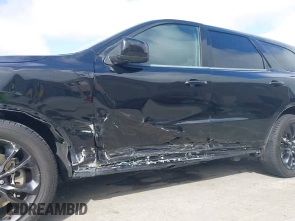 2022 Dodge Durango SXT with VIN 1C4RDHAG9NC159322, listed as a IAAI auction lot 42477809 with 82,361 mi miles and . Bid and sale history available at DreamBid. Image 6.