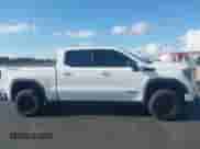 2023 GMC Sierra 1500 AT4 with VIN 3GTUUEE85PG233279, listed as a IAAI auction lot 42535960 with 30,682 mi miles and . Bid and sale history available at DreamBid. Image 14.