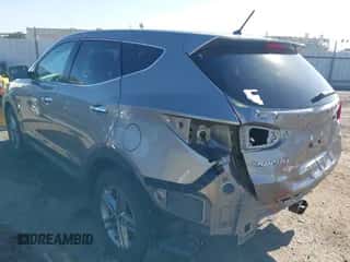 2018 Hyundai Santa Fe 2.4L with VIN 5NMZTDLB9JH084453, listed as a IAAI auction lot 43428772 with 103,023 mi miles and . Bid and sale history available at DreamBid. Image 3.