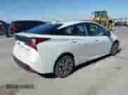 2021 Toyota Prius LE with VIN JTDL9MFU8M3029027, listed as a IAAI auction lot 43354130 with 66,497 mi miles and . Bid and sale history available at DreamBid. Image 4.