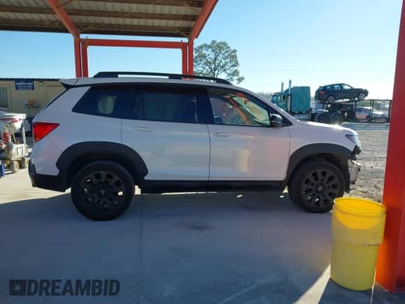 2022 Honda Passport Elite with VIN 5FNYF8H07NB017245, listed as a IAAI auction lot 41283944 with 35,780 mi miles and . Bid and sale history available at DreamBid. Image 13.